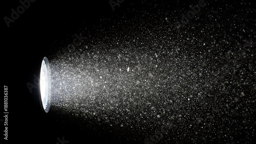 Volumetric Light Beam Illuminating Floating Dust Particles on Black Background
