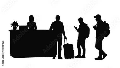 Silhouettes of people at a hotel reception desk checking in