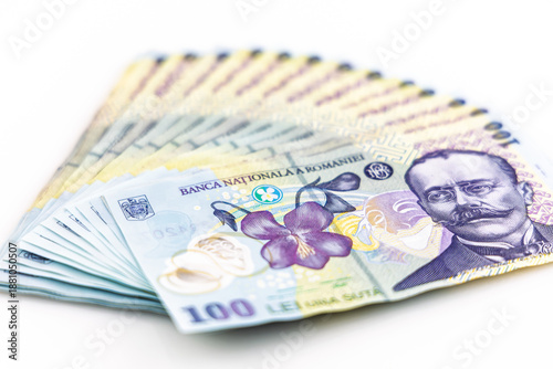 Romanian currency. Banknotes of 100 lei, currency code, RON, on a white background.