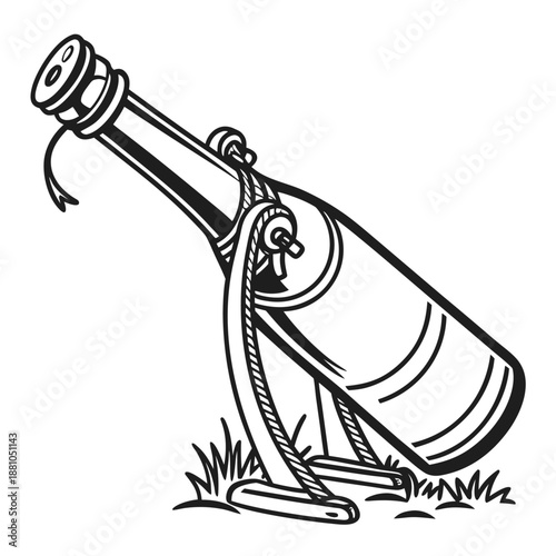 Vintage message bottle lying in grassy field