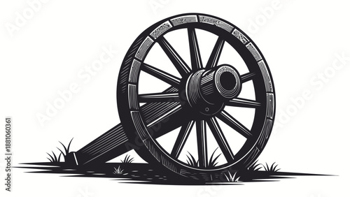 Vintage cannon wheel in abandoned field with grass