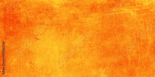 A vintage textured backdrop featuring stained orange paint on an aged parchment paper wall with a dirty grungy design for a retro blank book page
