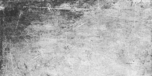 A vintage dark grey grunge wall texture background features a rough aged concrete surface with dirty paint splatters and a weathered stone pattern for an old industrial design backdrop