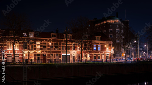 The Hague cityscape with historic telephone exchange and canal