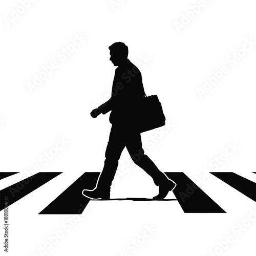 Silhouette of a man walking on the road