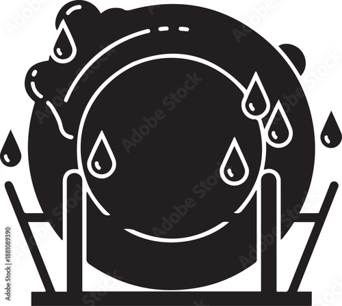 Black and white of a plate being washed in a dishwasher rack with water droplets washing cleaning