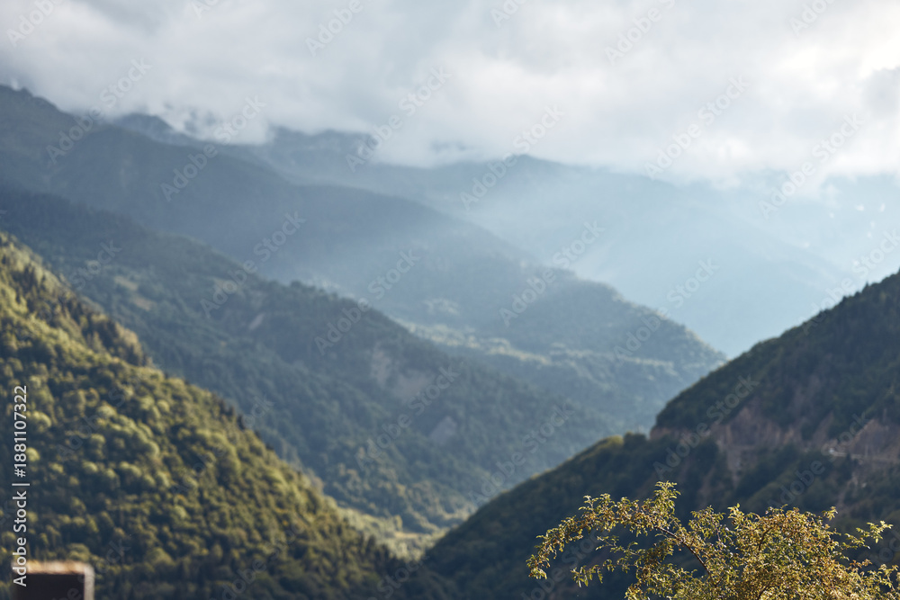 Obraz premium Mountain valley landscape with mist