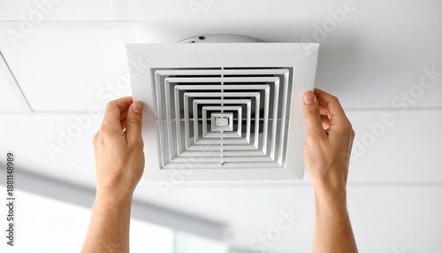 Hand Installing a New Ceiling Air Vent