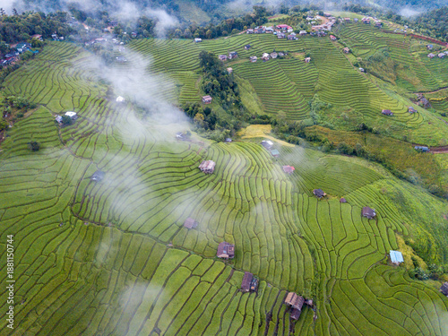Photos Rice terrace field of Pa Bong Piang during rainy season with cloud and fog over