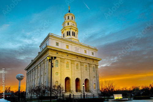 Nauvoo IL temple at sunrise with bright colored sky