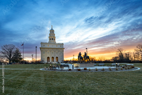 Nauvoo IL Temple at sunrise with bright red and yellow sky
