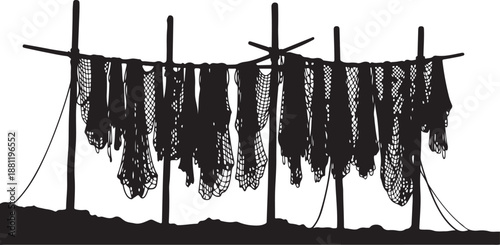 Fishing nets hanging on a rack to dry slowly