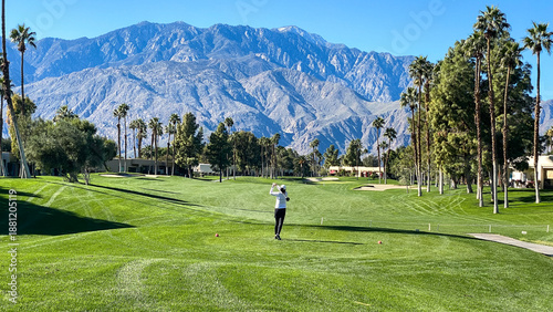 Woman Golfer Teeing Off on Palm Springs Golf Course