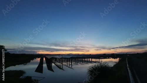Wallpaper Mural Time-lapse photography of solar photovoltaic panels at sunset Torontodigital.ca