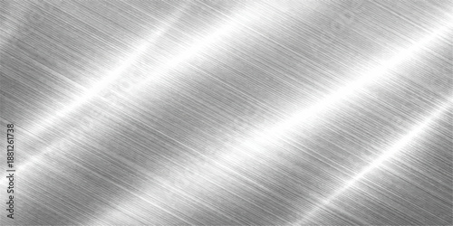 Brushed metal plate texture features a polished stainless steel surface with a shiny silver aluminum pattern and gray metallic reflections on an industrial chrome material sheet