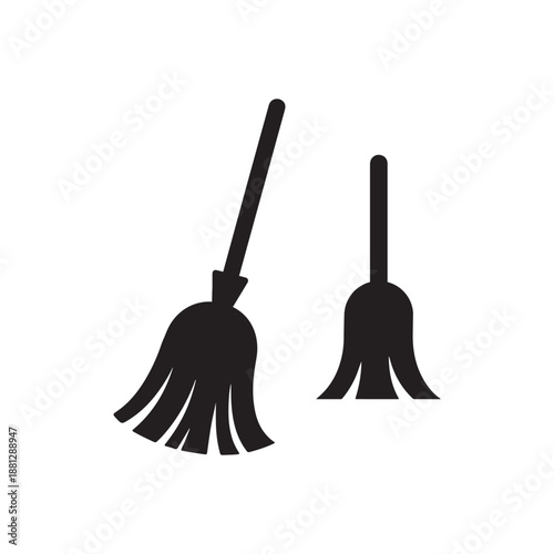 Two black silhouettes of brooms.