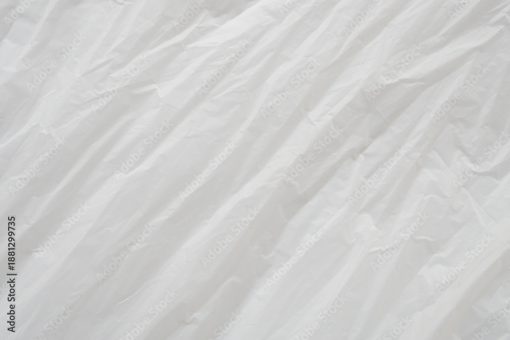 Obraz premium Crumpled White Plastic Sheet Surface Texture Background