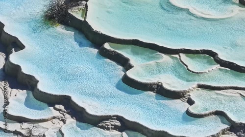 Close up of multi-colored pond at Huanglong Scenic and Historic Interest Area