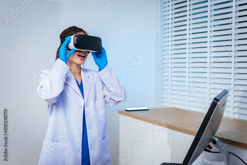 An Asian female doctor uses virtual reality controllers at a clinic desk, exploring immersive medical simulation, digital healthcare training, advanced technology applications, education, diagnosis