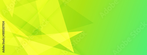 Abstract mosaic of lime green and yellow triangles with varying transparency and sharp edges