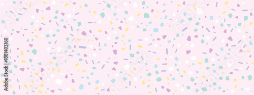 Soft pink background with colorful abstract terrazzo mosaic pieces in pastel tones