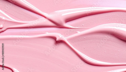 Macro texture of pink nail polish or lip gloss. A beautiful, creamy smear of a cosmetic product swatch. Beauty industry backgrounds