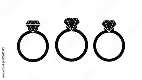 Three diamond rings are displayed in a row against a white background.