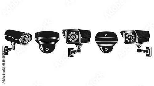 A collection of five black surveillance cameras mounted on white walls.