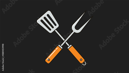 Crossed kitchen spatula and barbecue fork with orange handles against a dark background for various culinary themes.