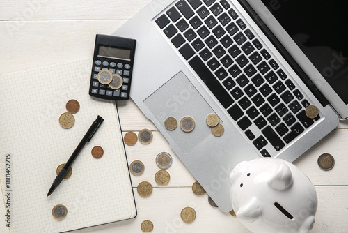 Calculator with coins, lapt...