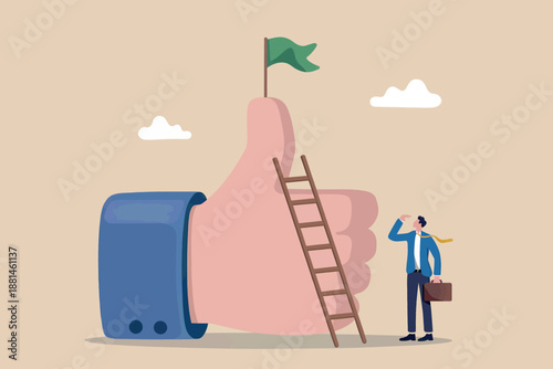 Ambitious businessman looking up at a flag on a giant thumbs up, symbolizing career success and social media achievement