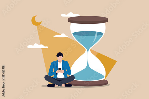 Man with smartphone sitting near hourglass, symbolizing time management and waiting