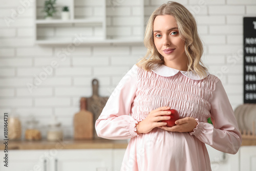 Young pregnant woman with a...