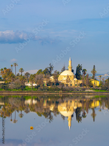 Reflection of Hala Sultan Tekke mosque in lake near city Larnaca, Cyprus