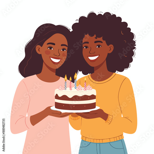 Two smiling women holding a birthday cake together in a joyful celebration viewed from the front