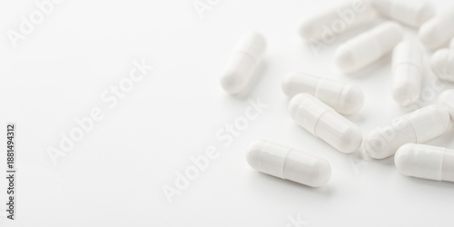 Wallpaper Mural White pills on a white background. Close up Torontodigital.ca