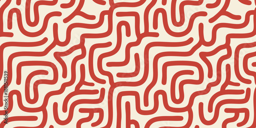 Intricate red lines forming a complex pattern on a neutral background from a direct viewpoint