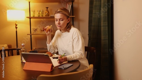 Enjoying a quiet evening meal while studying at home 