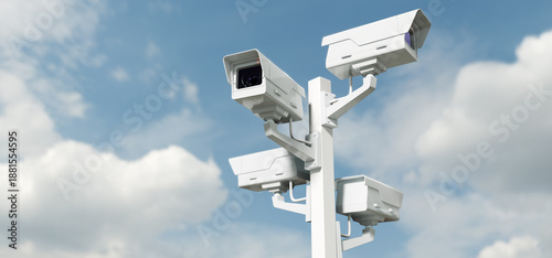 Bild auf Leinwand Street surveillance, security cameras on pole, total control concept background