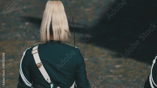 Royal guardsman wearing traditional uniform marching