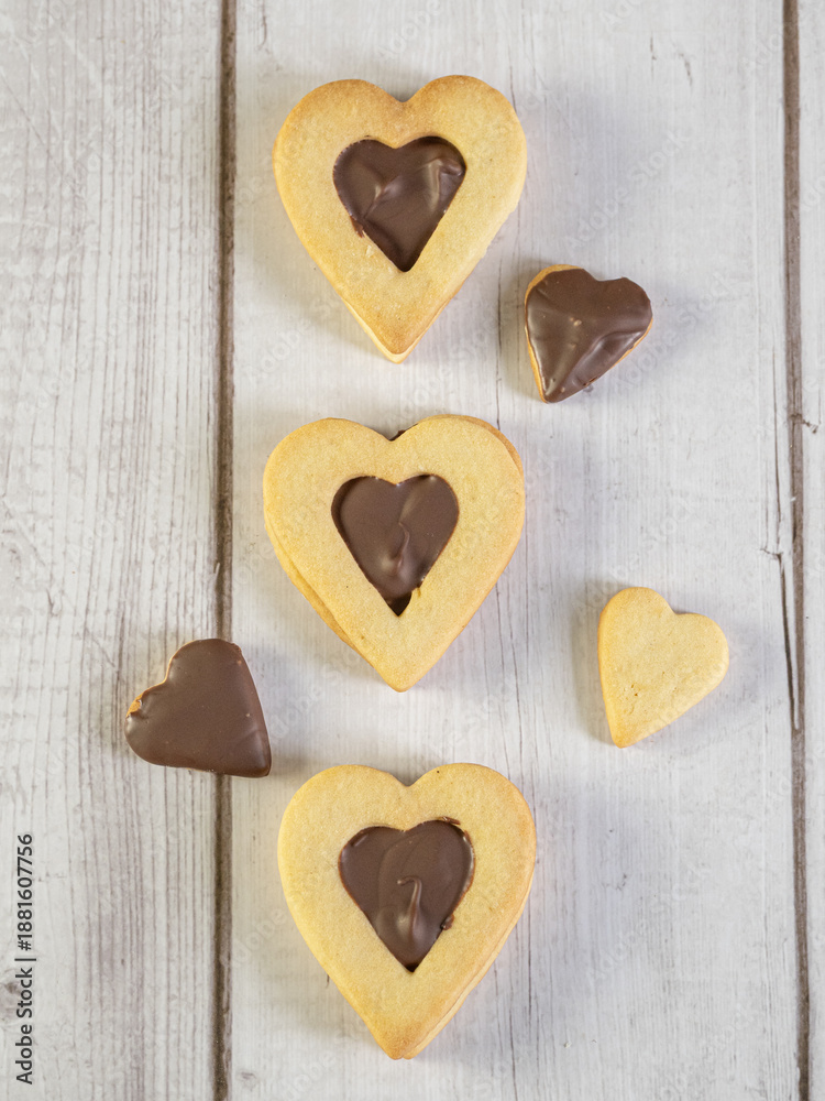 Fototapeta premium Top view of heart-shaped cookies