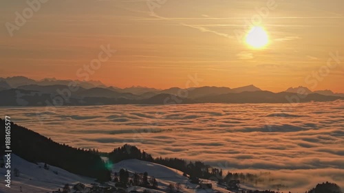Beautiful sunset over the cloud sea in Switzerland