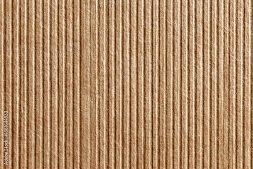 Close-up of repeating vertical lines on a textured surface, resembling corrugated material