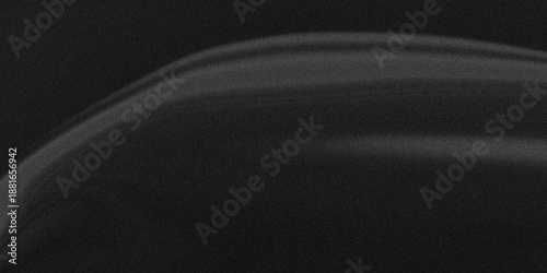 Dark monochrome abstract background with a sleek, liquid wave and a subtle grainy texture, creating a moody and luxurious effect for a sophisticated fashion or premium product brand.