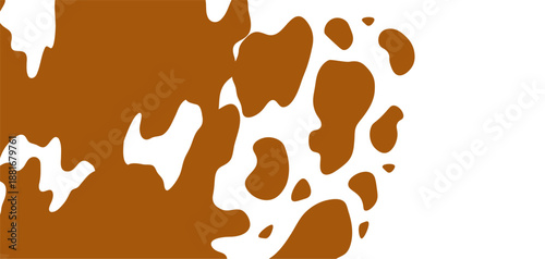 Cow skin brown and white spots background on white surface. Cowhide animal print texture. Cattle hide concept for design and print.
