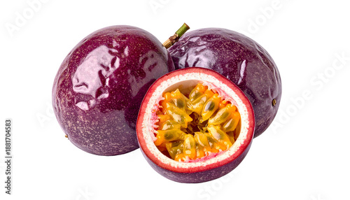 Three passion fruits, one sliced, revealing seeds and pulp, on a black background