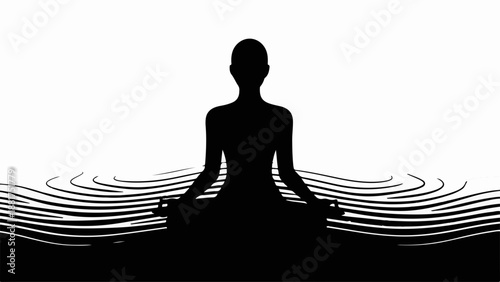 Silhouette of person meditating peacefully in calm water ripples