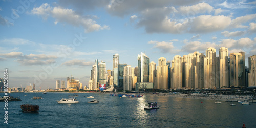 Photography Dubai real estate 2026 background with Dubai Marina skyline at sunset