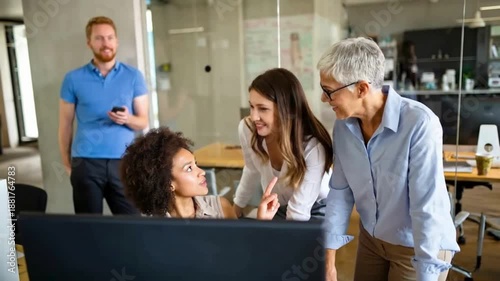 Cross-Functional Team Reviewing Project on Desktop | Business Colleagues Collaborating in Open Office | Real-Time Feedback Session with Digital Workspace