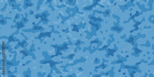 Abstract blue camouflage pattern with irregular shapes and varying shades